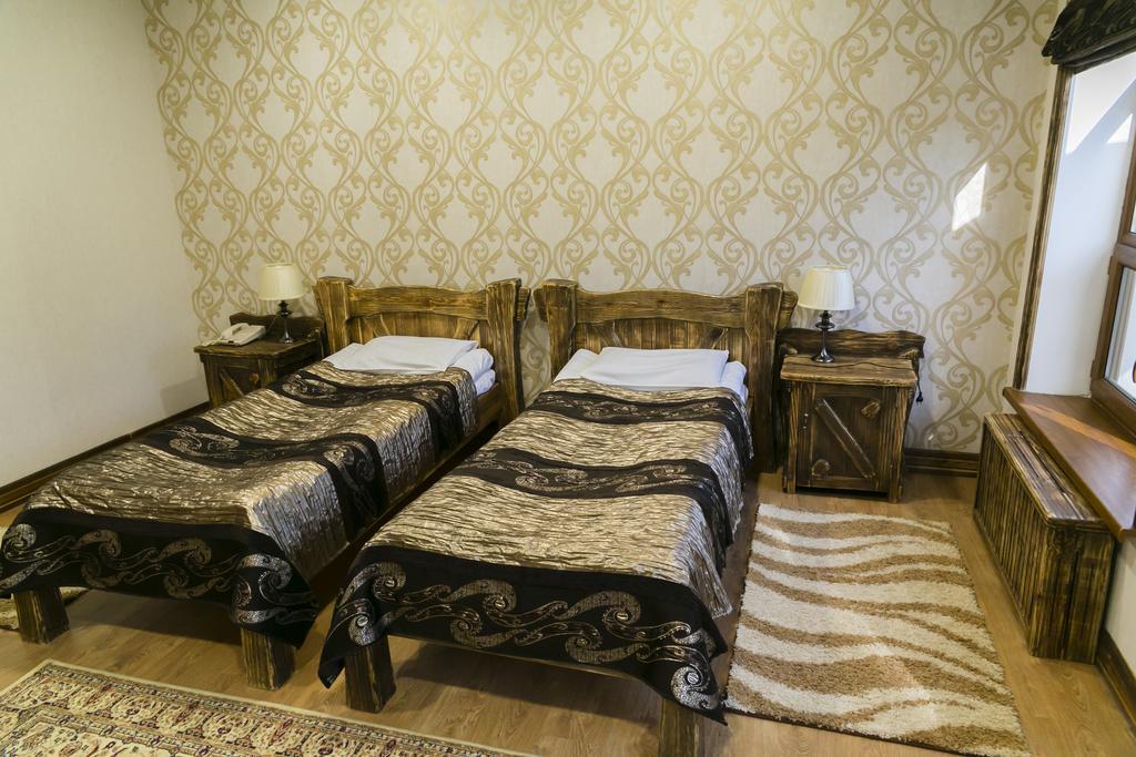 Отель Green Land Актобе Номер фото